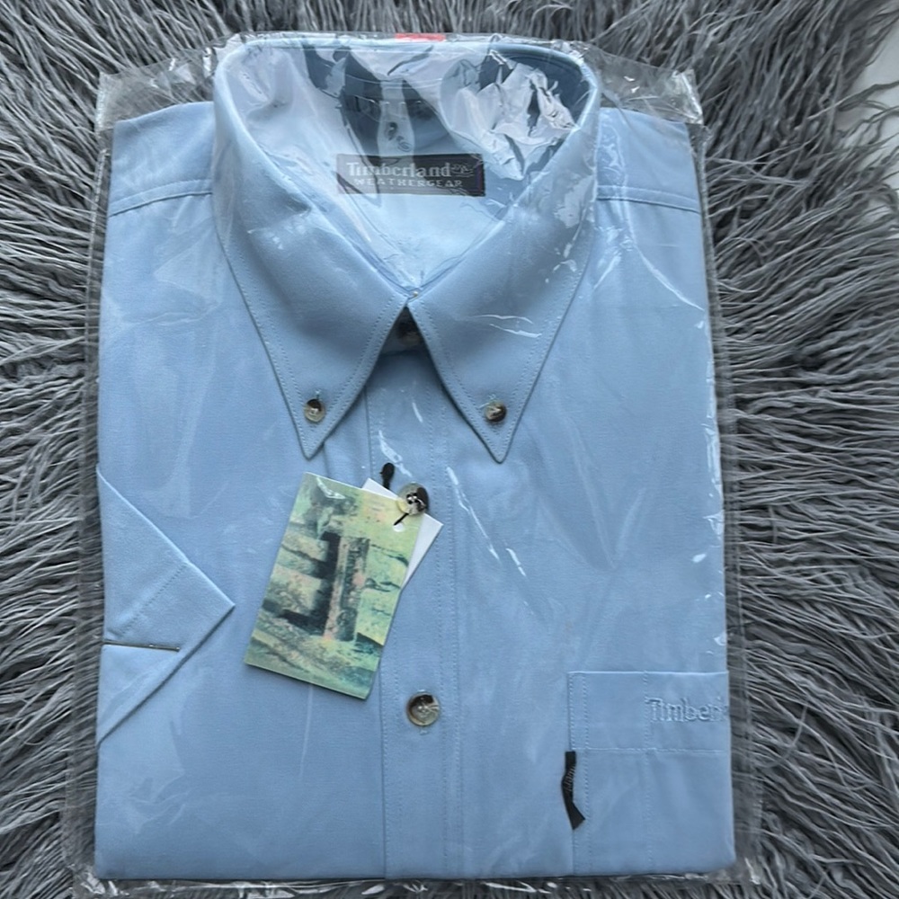 Brand new timberland blue polo shirt
